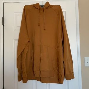 Mustard-colored hoodie